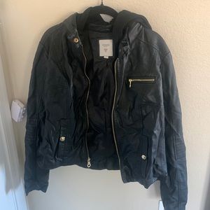GUESS leather jacket with black hoodie and gold zippers